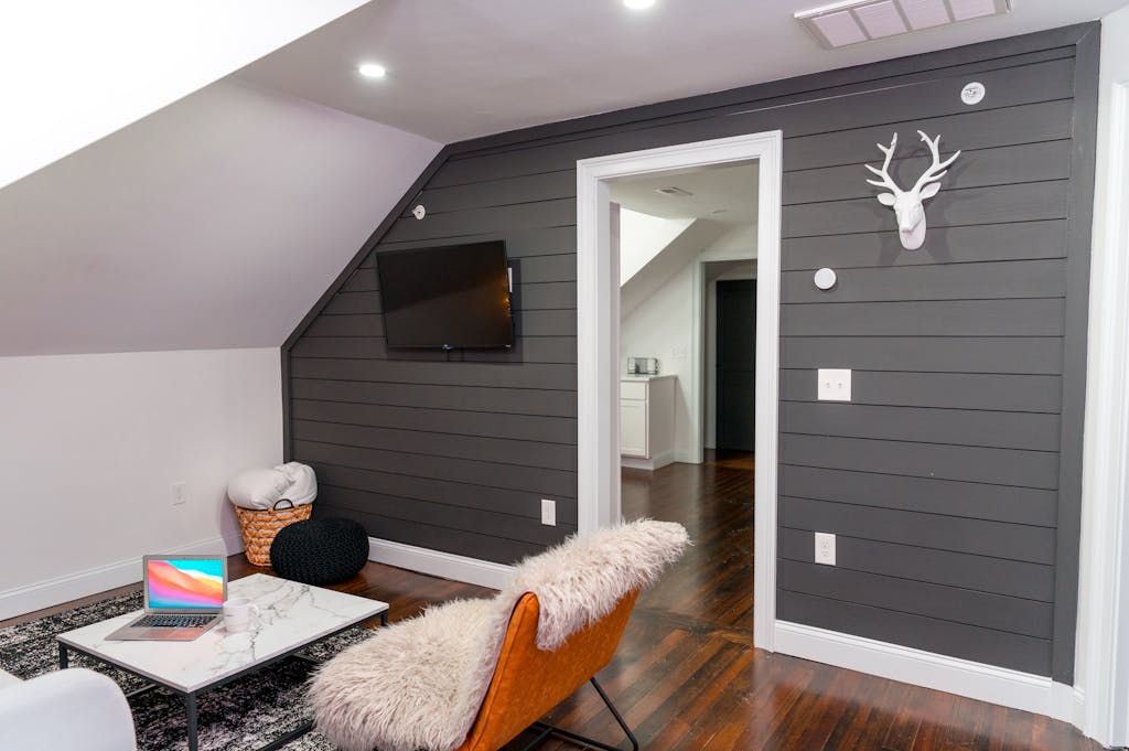 Stylish loft space featuring modern decor and faux fur accents in a cozy setting.