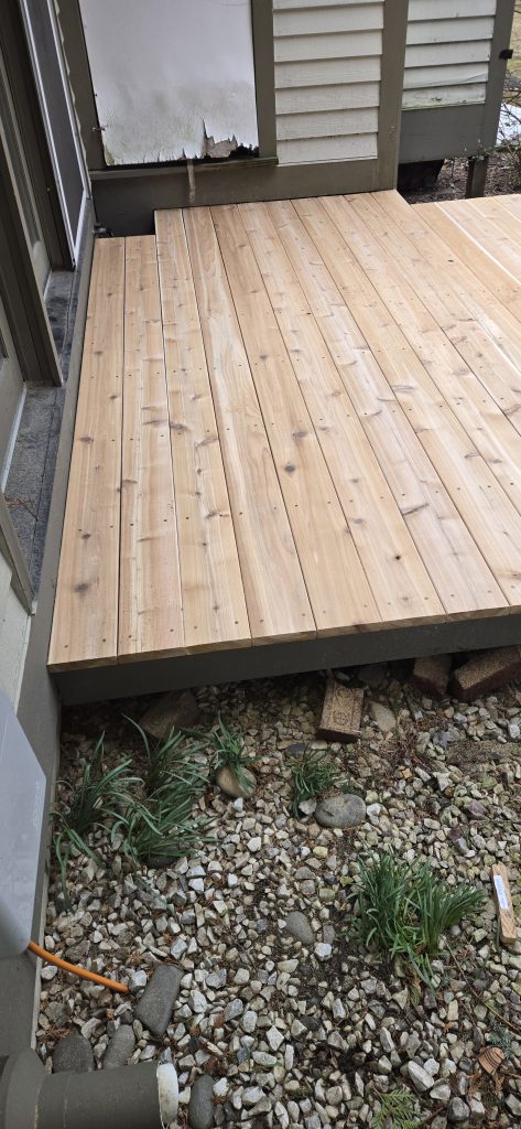 Cedar-Deck-Boards-Fitted-Around-House